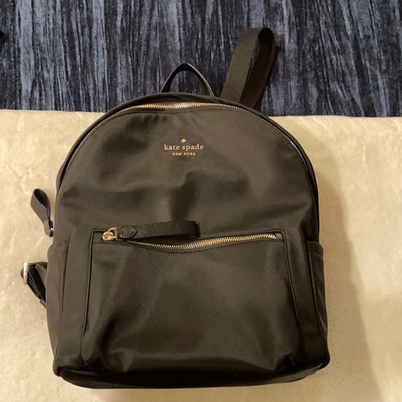 Black Kate Spade backpack. Used twice- given as a gift in August 2021